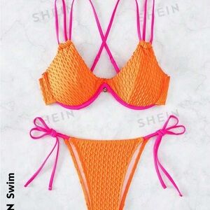 Neon orange and pink bathing suit